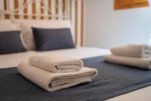 Posteľ alebo postele v izbe v ubytovaní La casita de Real de Cartuja - Apartamento Deluxe opción parking