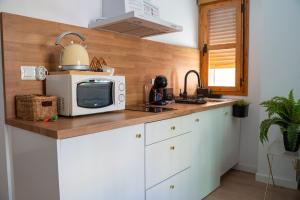 Kuchyňa alebo kuchynka v ubytovaní La casita de Real de Cartuja - Apartamento Deluxe opción parking