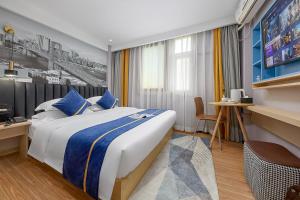 Ένα ή περισσότερα κρεβάτια σε δωμάτιο στο Lanyu Hotel-Guangzhou YongQingFang Tourist Scenic Spot Branch-Airport pick-up service