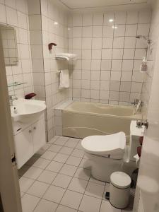 Koupelna v ubytování GAWA Hotel