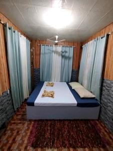 Postel nebo postele na pokoji v ubytování Hideaway B&B