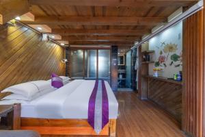 Yingxue Inn Duplex Suite Loft客房内的一张或多张床位