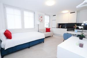 Kuchyň nebo kuchyňský kout v ubytování Modern Studio central location