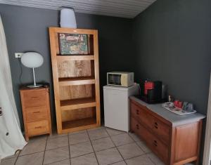 Kuchyň nebo kuchyňský kout v ubytování Poé Lodge - Une parenthèse au paradis
