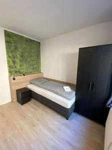 Postel nebo postele na pokoji v ubytování Hildesheim Pepperworth