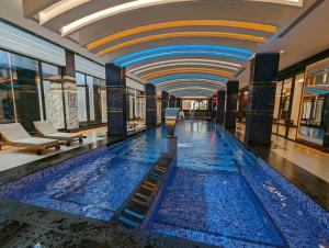 Bazén v ubytování Yekta Mall Trade Center nebo v jeho okolí