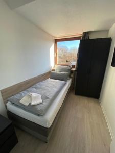 Postel nebo postele na pokoji v ubytování Hildesheim Pepperworth