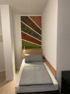 Postel nebo postele na pokoji v ubytování Hildesheim Pepperworth