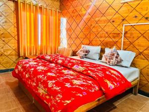 Postel nebo postele na pokoji v ubytování Hotel Himalayan View + 15 fotografií
