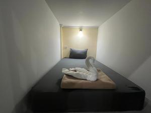 3 TIGERS Resort & Hostel客房内的一张或多张床位