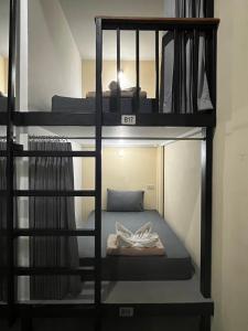3 TIGERS Resort & Hostel客房内的一张或多张床位