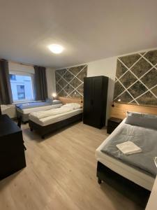 Postel nebo postele na pokoji v ubytování Hildesheim Pepperworth