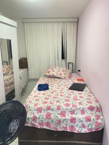 Ένα ή περισσότερα κρεβάτια σε δωμάτιο στο Temporada