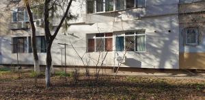a building with a window on the side of it at Secret Studio Braila in Brăila