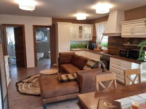 Η κουζίνα ή μικρή κουζίνα στο Steigerwald Resort