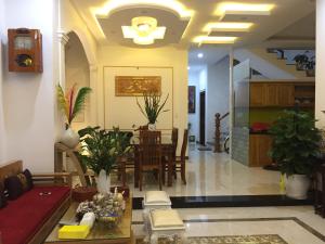 Posezení v ubytování The Arch Villa Hội An