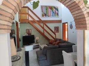 TV a/nebo společenská místnost v ubytování Tara Casa