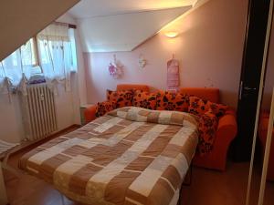 Postel nebo postele na pokoji v ubytování Ale Sweet Home