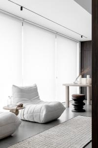 Katil atau katil-katil dalam bilik di Apto Boutique Centro Balneário Camboriú - Raízes