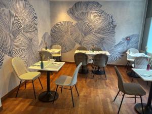 Um restaurante ou outro lugar para comer em Mercure Nantes Centre Grand Hotel