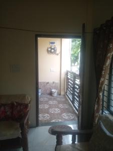 Un lugar para sentarse en Viraj Tours And Travels And Homestay Indore 3 fotos más