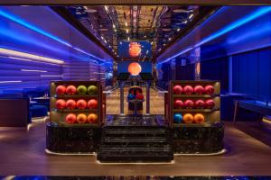 two boxes of apples on a bowling alley at InterContinental Taichung by IHG in Taichung