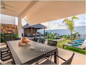 Photo de la galerie de l'établissement SG12 l Villa ISA l Prestige Grand Baie l Piscine l 6 pers, à Grand Baie