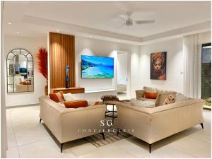 Photo de la galerie de l'établissement SG12 l Villa ISA l Prestige Grand Baie l Piscine l 6 pers, à Grand Baie