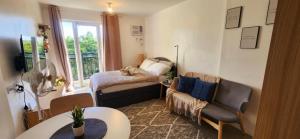 Postel nebo postele na pokoji v ubytování The Cozy Inn