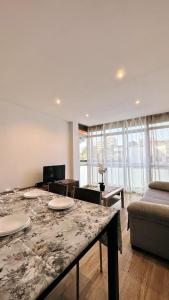 Televízia a/alebo spoločenská miestnosť v ubytovaní Apartsalou Tati + 14 fotografií