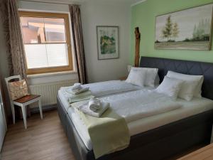 Posteľ alebo postele v izbe v ubytovaní Wohnung mit Charme in Pinsdorf