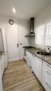 Kuchyňa alebo kuchynka v ubytovaní Apartsalou Tati