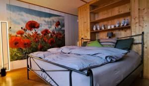 Postel nebo postele na pokoji v ubytování Gadänäscht + 16 fotografií