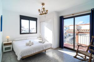 Posteľ alebo postele v izbe v ubytovaní Bahia 49 Apartments Casasol