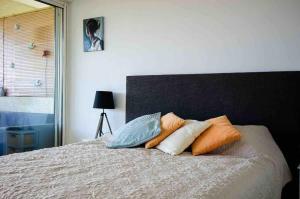 Casamea - Vue mer, Terrasse, Clim, Proche Plage客房内的一张或多张床位