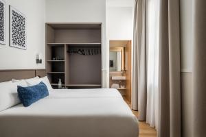 Postel nebo postele na pokoji v ubytování BYPILLOW Sinfonía