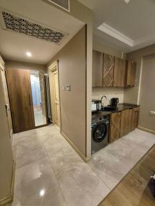 Kuchyň nebo kuchyňský kout v ubytování Boutique Hotel Mimino