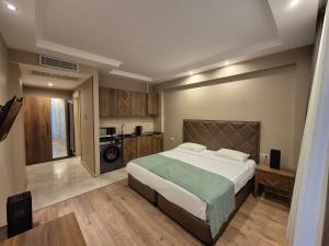 Kuchyň nebo kuchyňský kout v ubytování Boutique Hotel Mimino