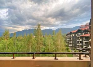 a view from the balcony of a resort at TERRA Vista Penthouse near Pirin Golf and Bansko in Razlog