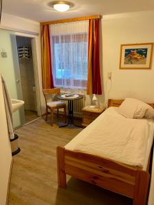 Postel nebo postele na pokoji v ubytování Haus Gröblacher