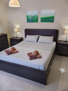 Voodi või voodid majutusasutuse b&b Denis toas