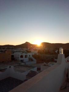 a view of the sunset from the roof of a building at Elmoubaraka2 in Tataouine