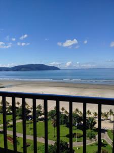 a view of the beach from a balcony at Frente Mar Santos 130 m2 in Santos