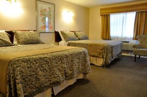 Posteľ alebo postele v izbe v ubytovaní Rosedale Motel
