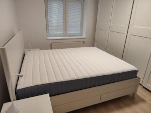 Postel nebo postele na pokoji v ubytování Byt 3 1, Zlín, Obeciny