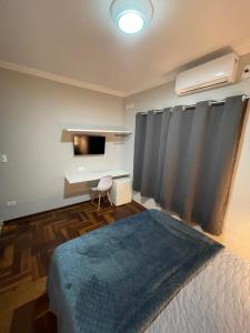 Ένα ή περισσότερα κρεβάτια σε δωμάτιο στο Hotel Silver