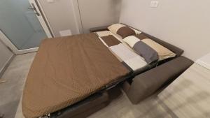 a large bed in a room with at BnB Martorelli in Turin