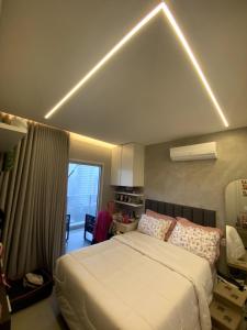 Katil atau katil-katil dalam bilik di Luxury Apartment at Umarizal COP30