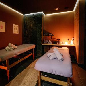 Кровать или кровати в номере Sadu Hotel Almaty, a member of Radisson Individuals