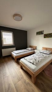 Postel nebo postele na pokoji v ubytování Ferienwohnung Casa Amedea + 17 fotografií